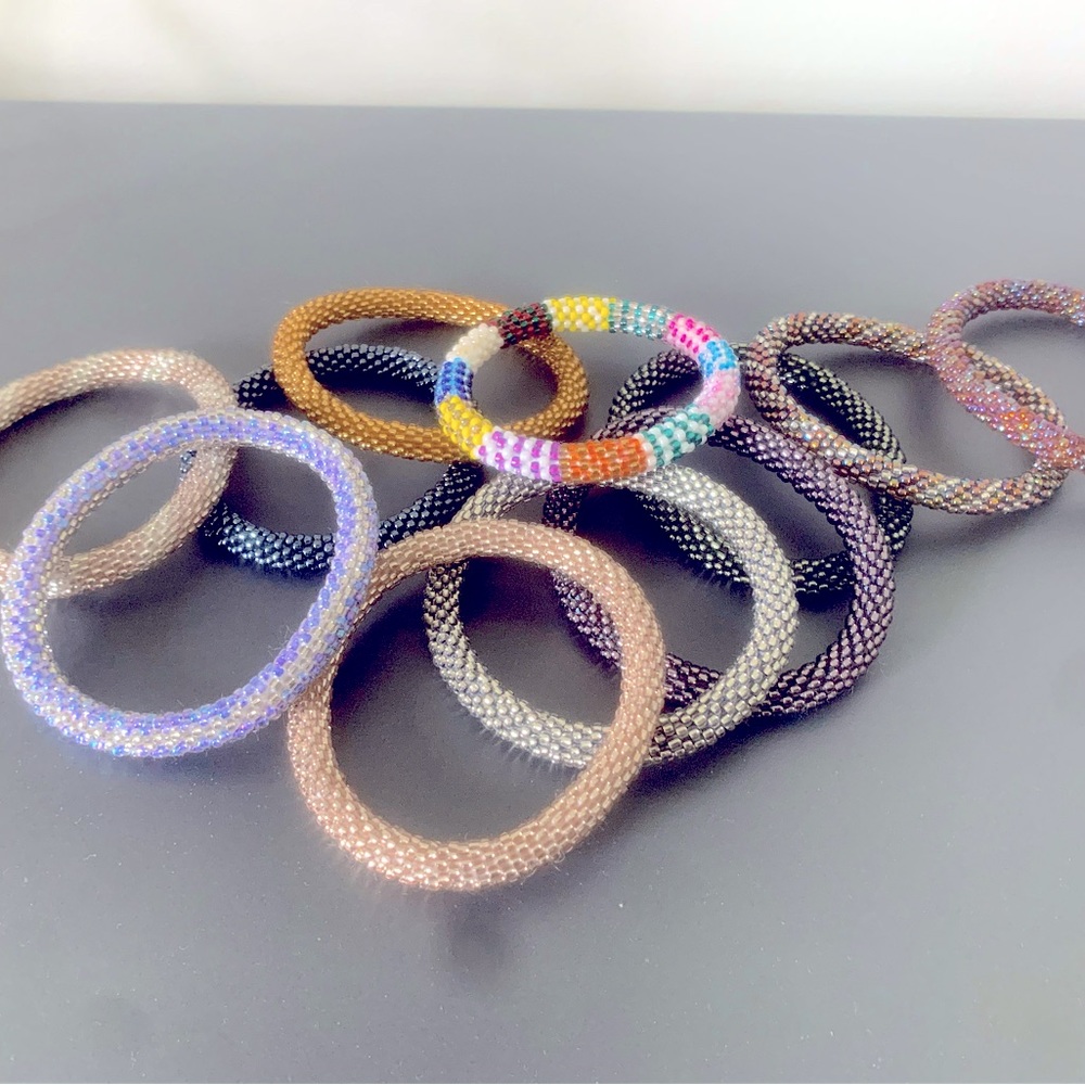 Intricately beaded bracelets of many different colors